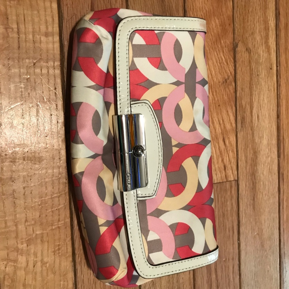 Coach clutch with wrist strap